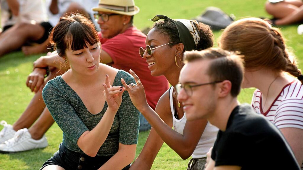 Clubs and Organizations -Students on the lawn on campus - Forest Biomaterials NC State University