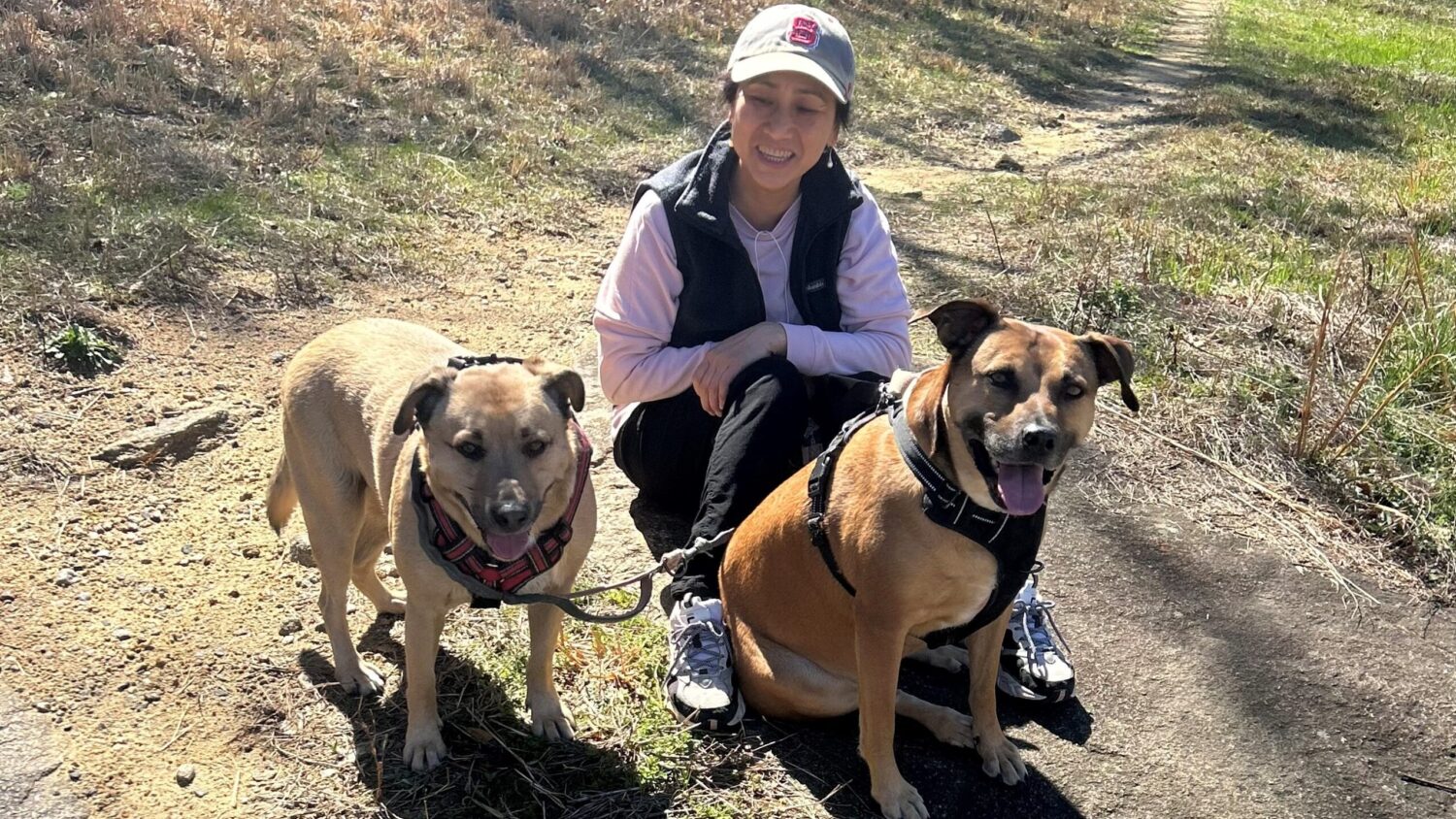 Loi with dogs - Meet Loi Tran - Forest Biomaterials NC State University