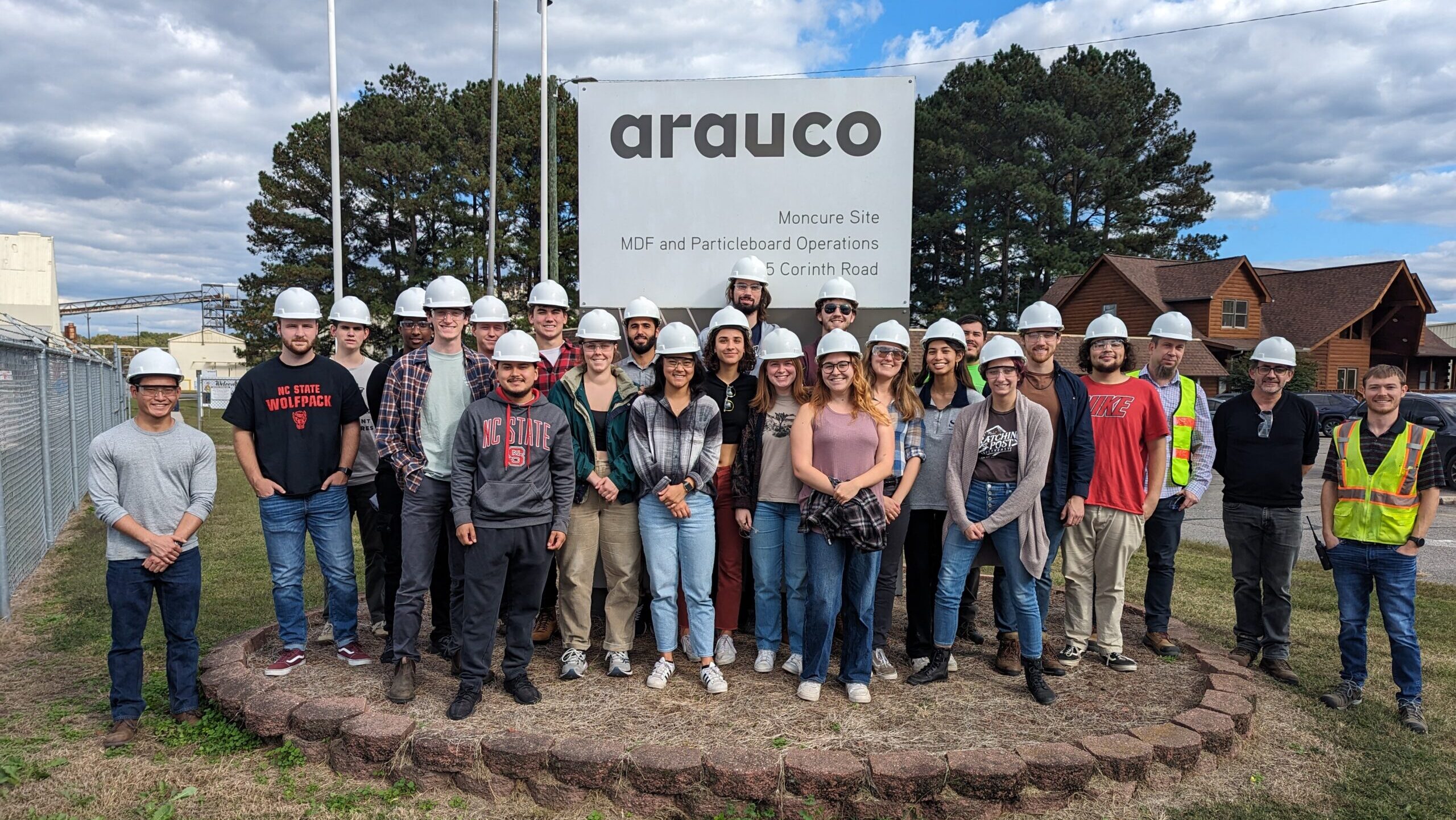 Group photo in front of arauco - Arauco Company Visit: Enhancing Student's Curriculum Comprehension through Industry Exposure - Forest Biomaterials NC State University