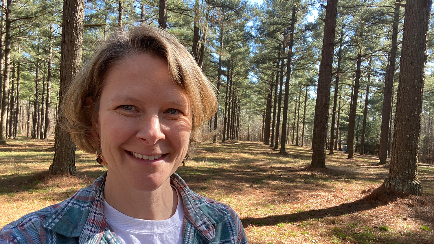 Elizabeth poses in Schenck Forest - Women in Natural Resources: Meet Forest Manager Elizabeth Snider - Forestry and Environmental Resources NC State University