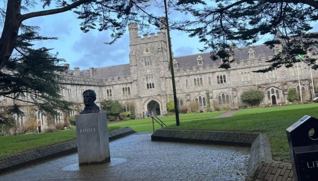 Pavilion with a small monument and a large castle-like academic building in the background - Kendra Familette’s Semester in Ireland - Department of Forestry and Environmental Resources at NC State