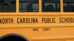 side of a yellow Wake County public school bus