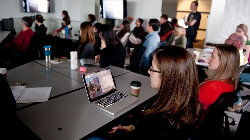 A photo of students in class at the North Carolina State University Center for Geospatial Analytics