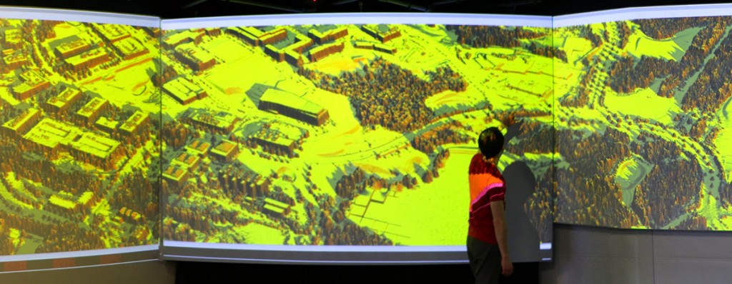 A presenter showing an example of geospatial modeling