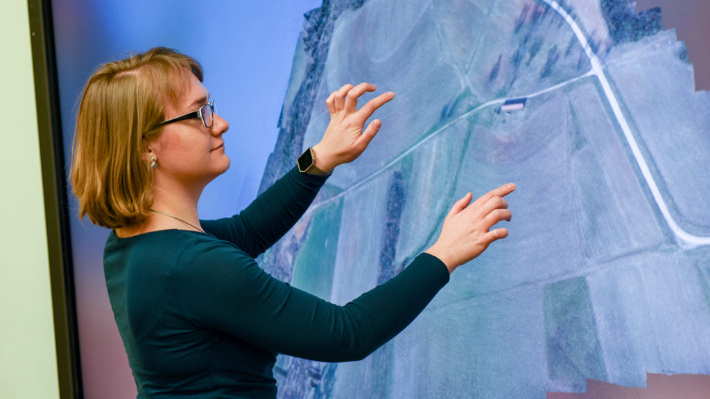 Justyna Jeziorska interacts with UAS data on a touchscreen