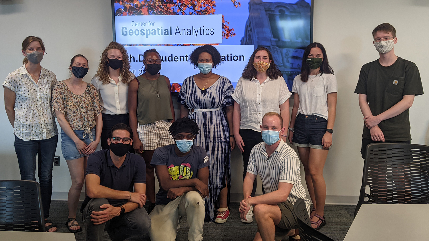 Students pose masked at Ph.D. orientation in Fall 2021 - "I use Geospatial Analytics To..." Part IV - Center for Geospatial Analytics at NC State University