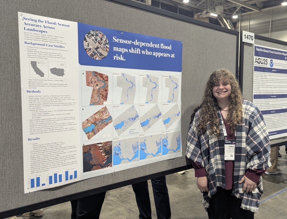 Emma Vail poses with her poster at the AGU annual meeting.