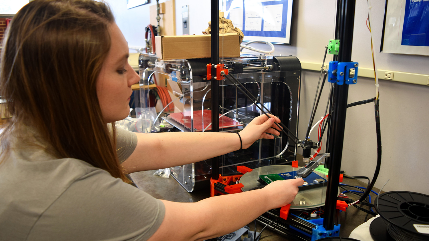 SMT student with 3-D printer