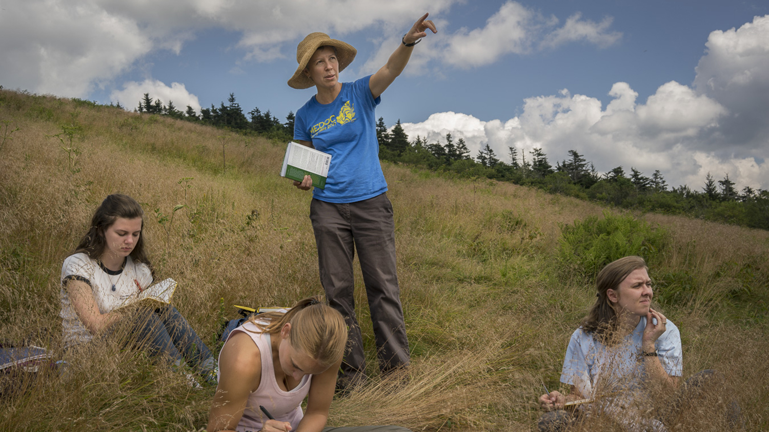 Dr Steph Jeffries teaching students in field