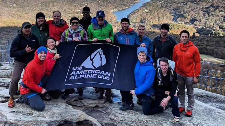 American Alpine Group poses for photo