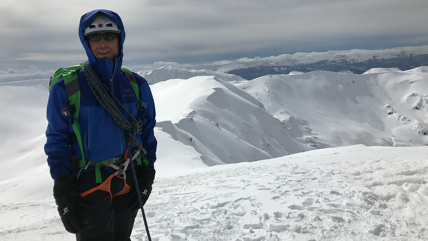 Student poses while climbing in Denali