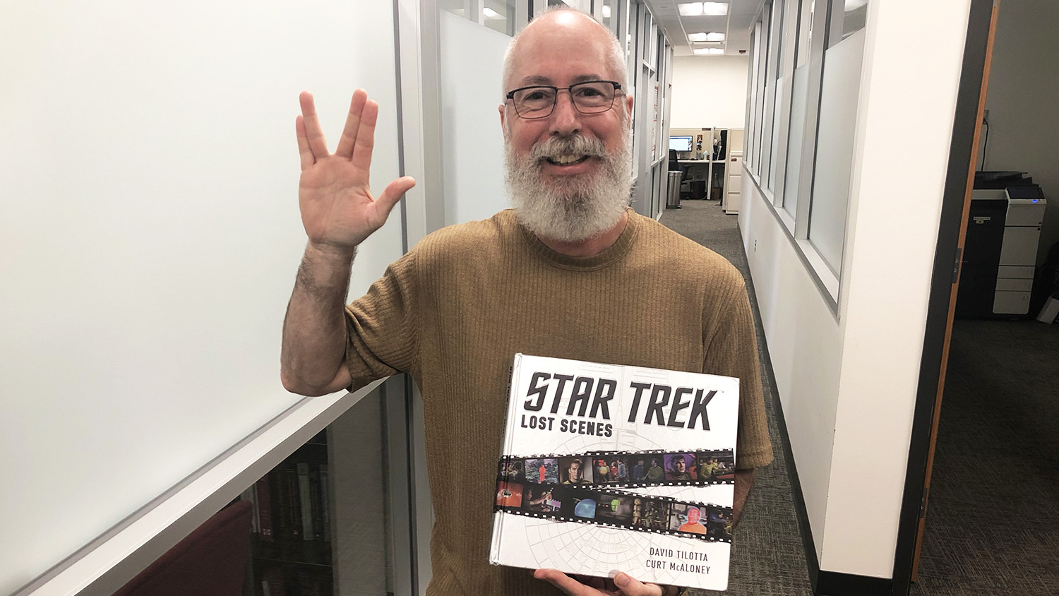 Chemist by Day, Trekkie by Night - David Tilotta holds the book he wrote on Star Trek's lost scenes
