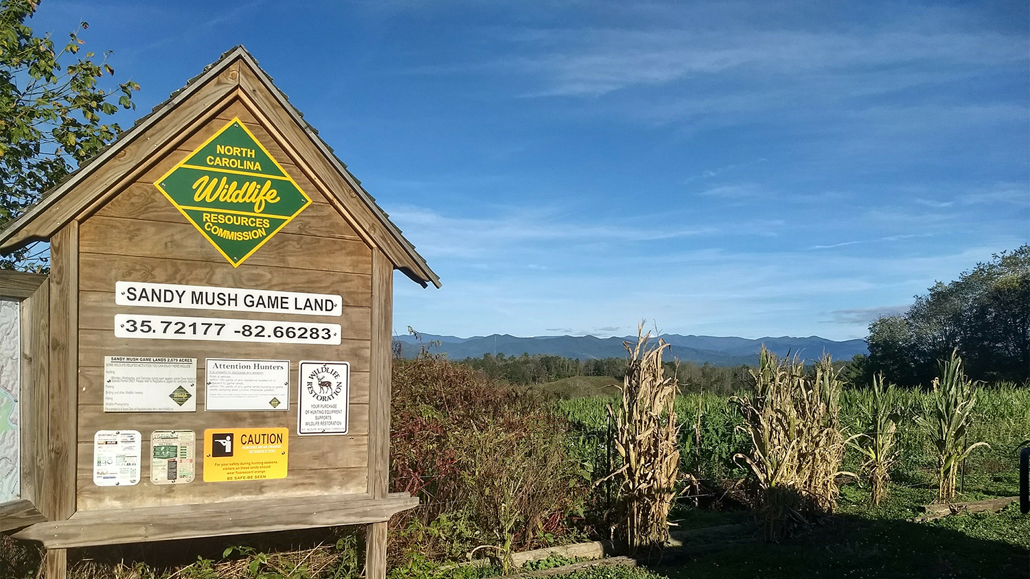 Sign for Sandy Mush overlooking game land