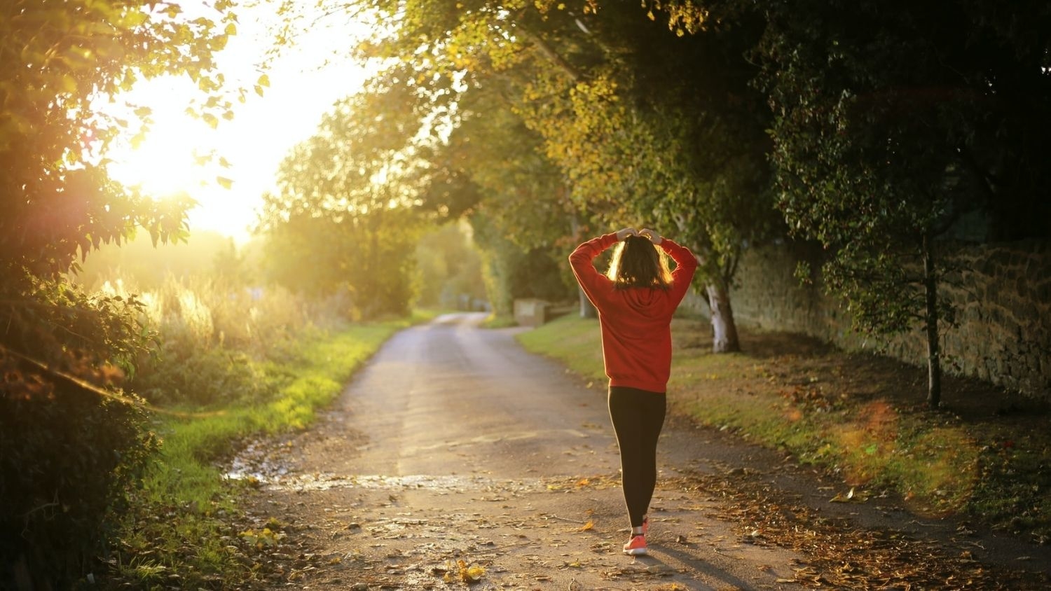 A person goes for a jog in the morning.