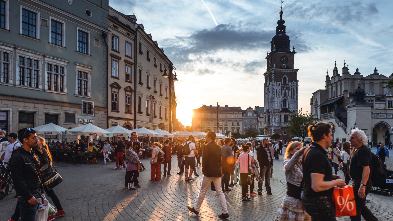 Tourists on Main Market Square in Krakow, Poland.