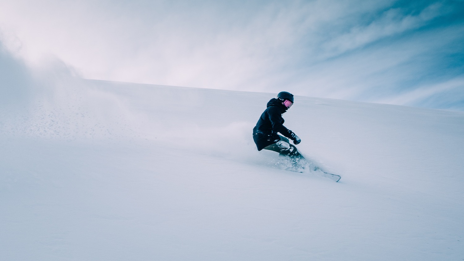 A person snowboarding on a mountainside - Beijing Winter Olympics a Cautionary Climate Tale, Expert Says - College of Natural Resources News - NC State University