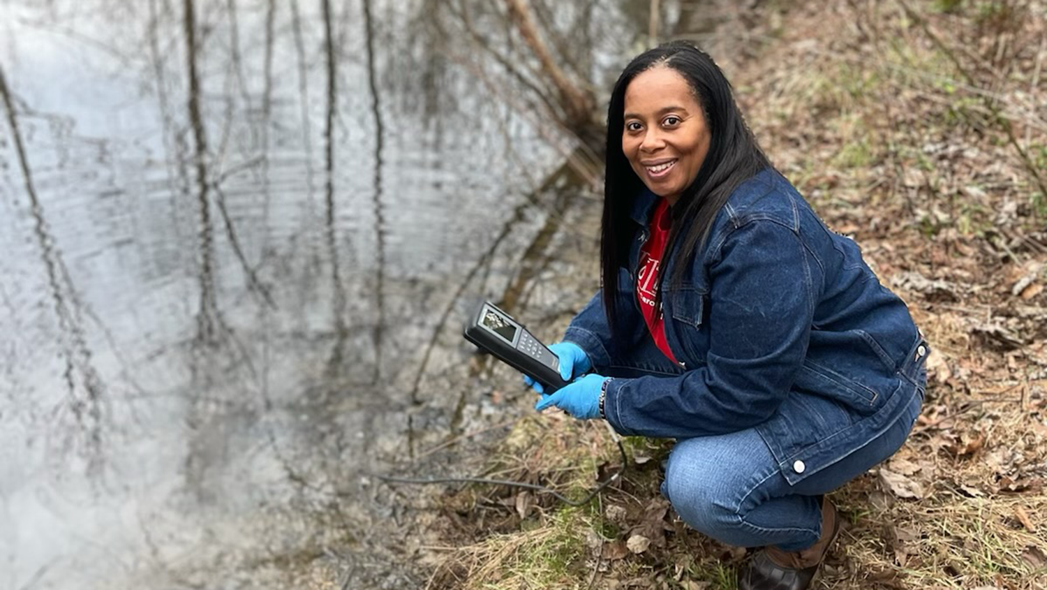 Angela poses outdoors - Celebrating Black Excellence: Angela Allen is Educating Future Leaders - College of Natural Resources News NC State University