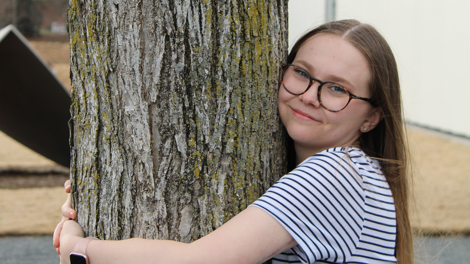Mary Marriott hugs a tree - Forestry Student Mary Marriott Awarded Prestigious Scholarship - College of Natural Resources News NC State University