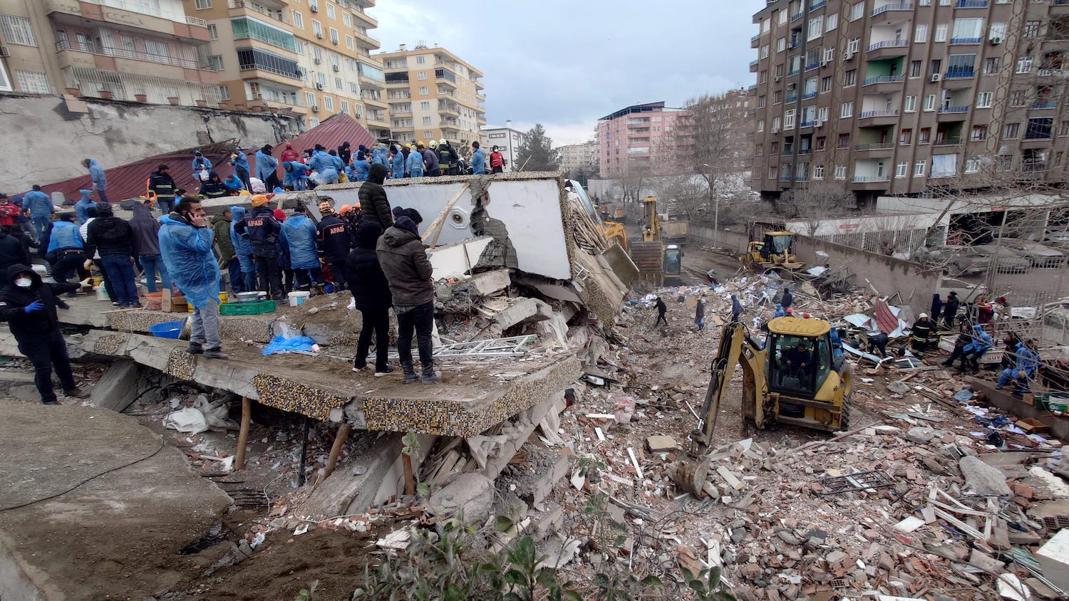 Rescue workers search through rubble in the Turkish city of Diyarbakir - Why the Turkey-Syria Earthquakes Were So Destructive - College of Natural Resources News NC State University