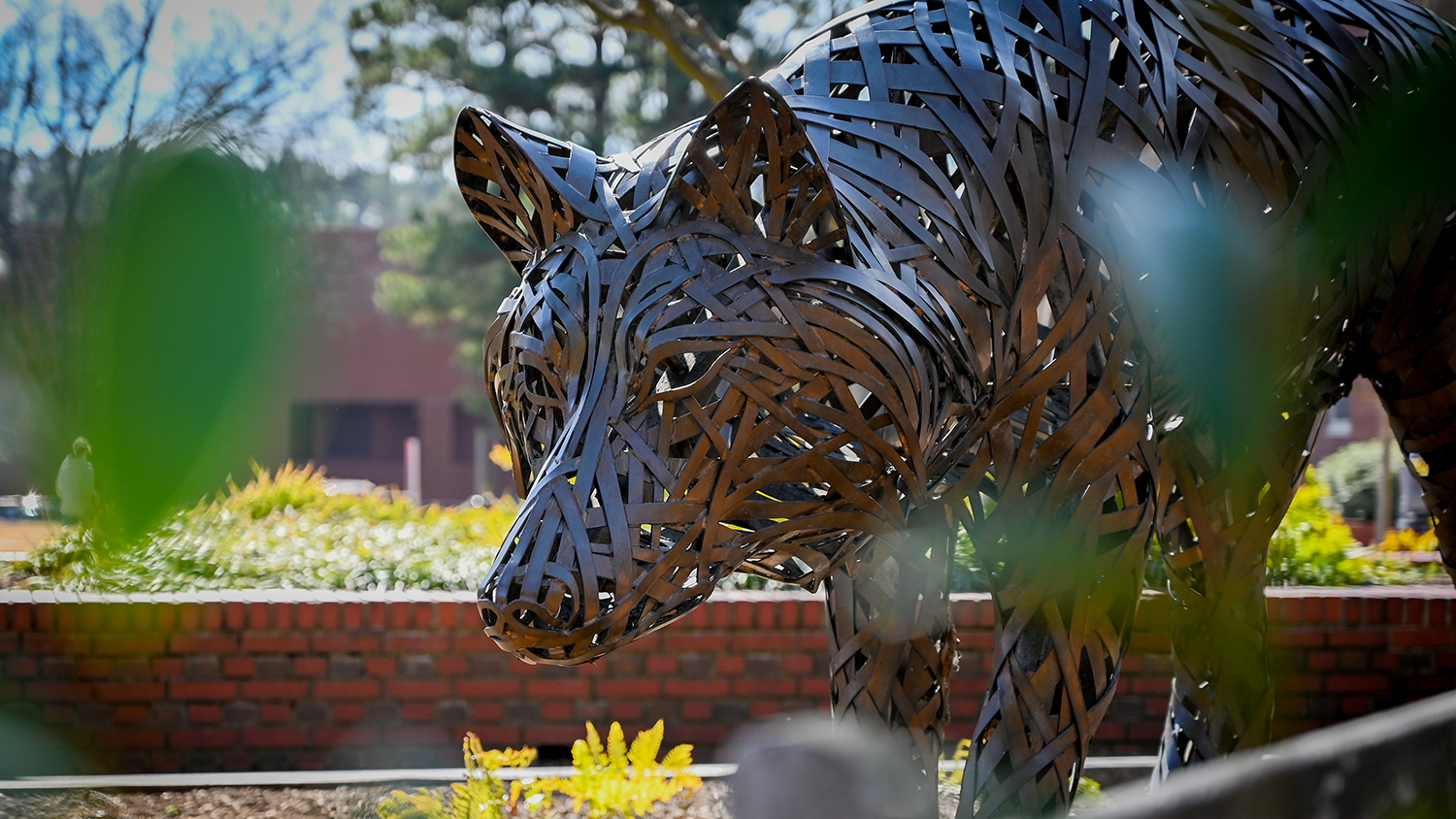 Close-up of copper wolf statue