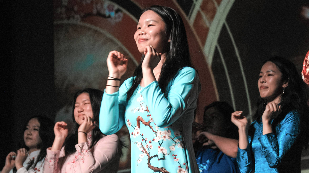 Skye Pham performs with other members of NC State’s Vietnamese Student Association as part of Viet Night 2022 at the Witherspoon Student Center.