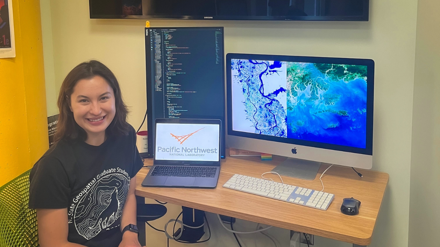 Jenna works at computer - Jenna Abrahamson Develops Remote Sensing Methods to Predict Flooding - College of Natural Resources at NC State University