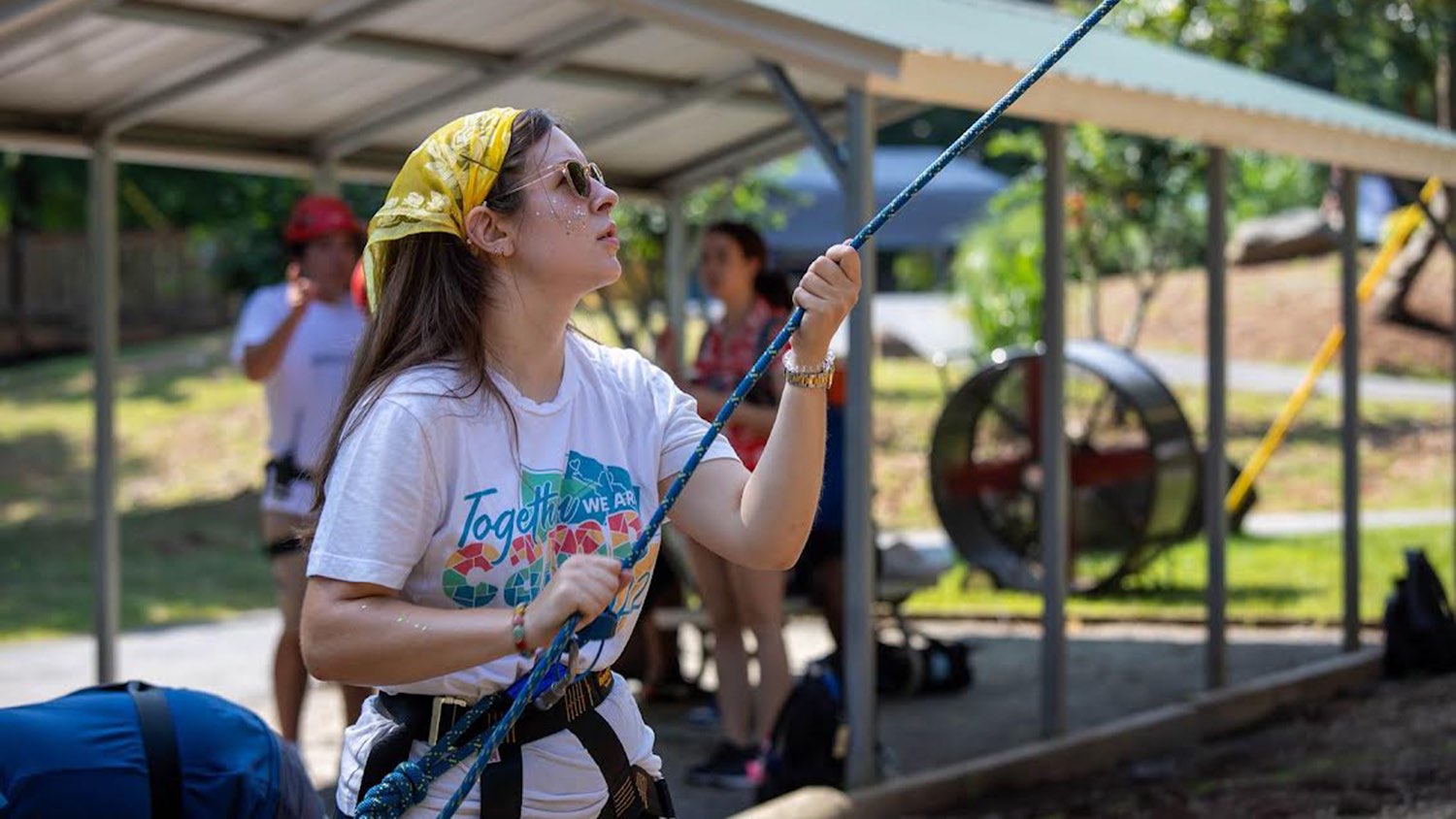 Cailsen Lackey holds a climbing rope - Cailsen Lackey Provides Inclusive Summer Camp Experiences - College of Natural Resources at NC State University