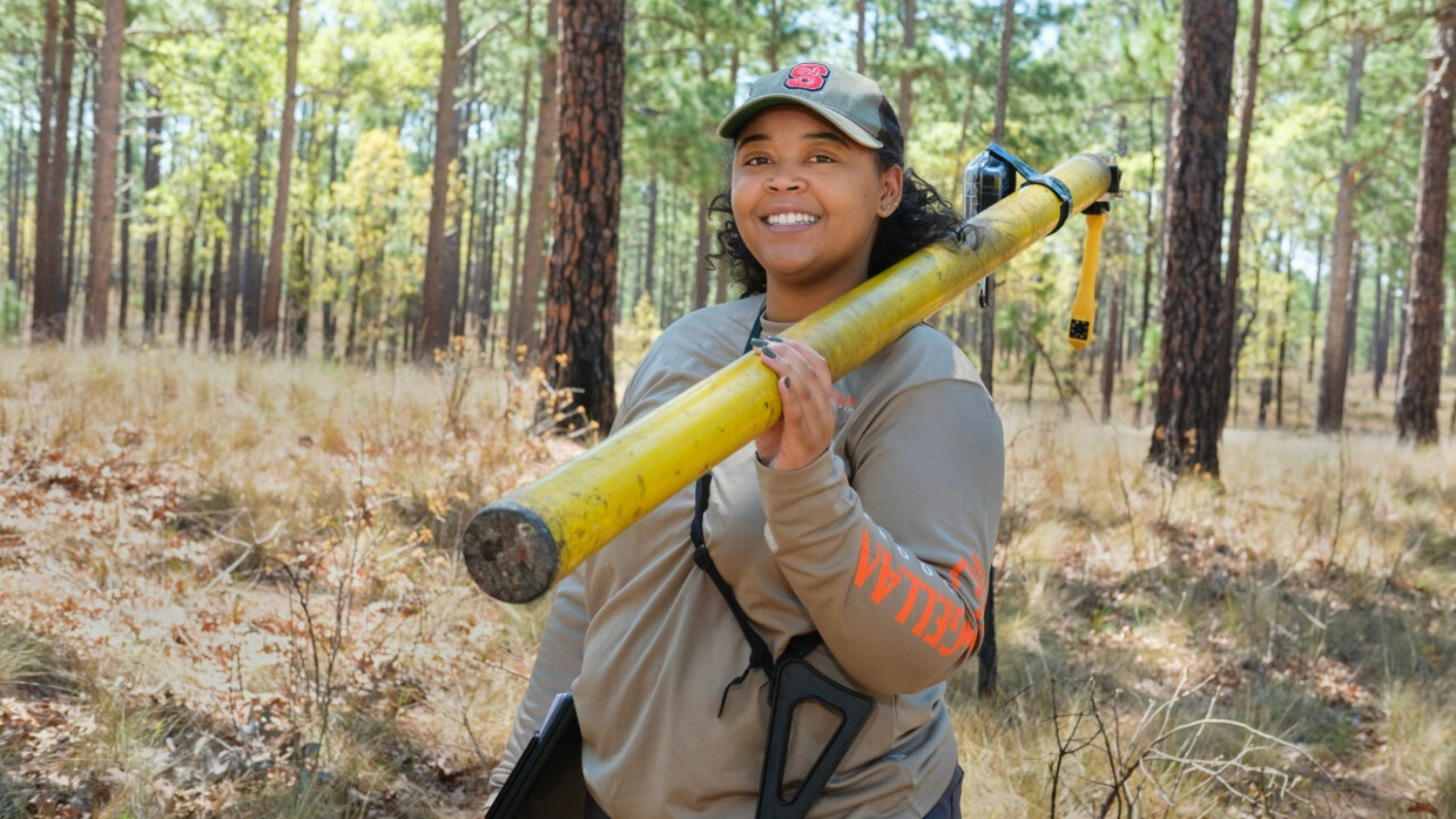 Lauren works in the woods - Lauren Pharr Named Young Conservationist of the Year - College of Natural Resources News NC State University