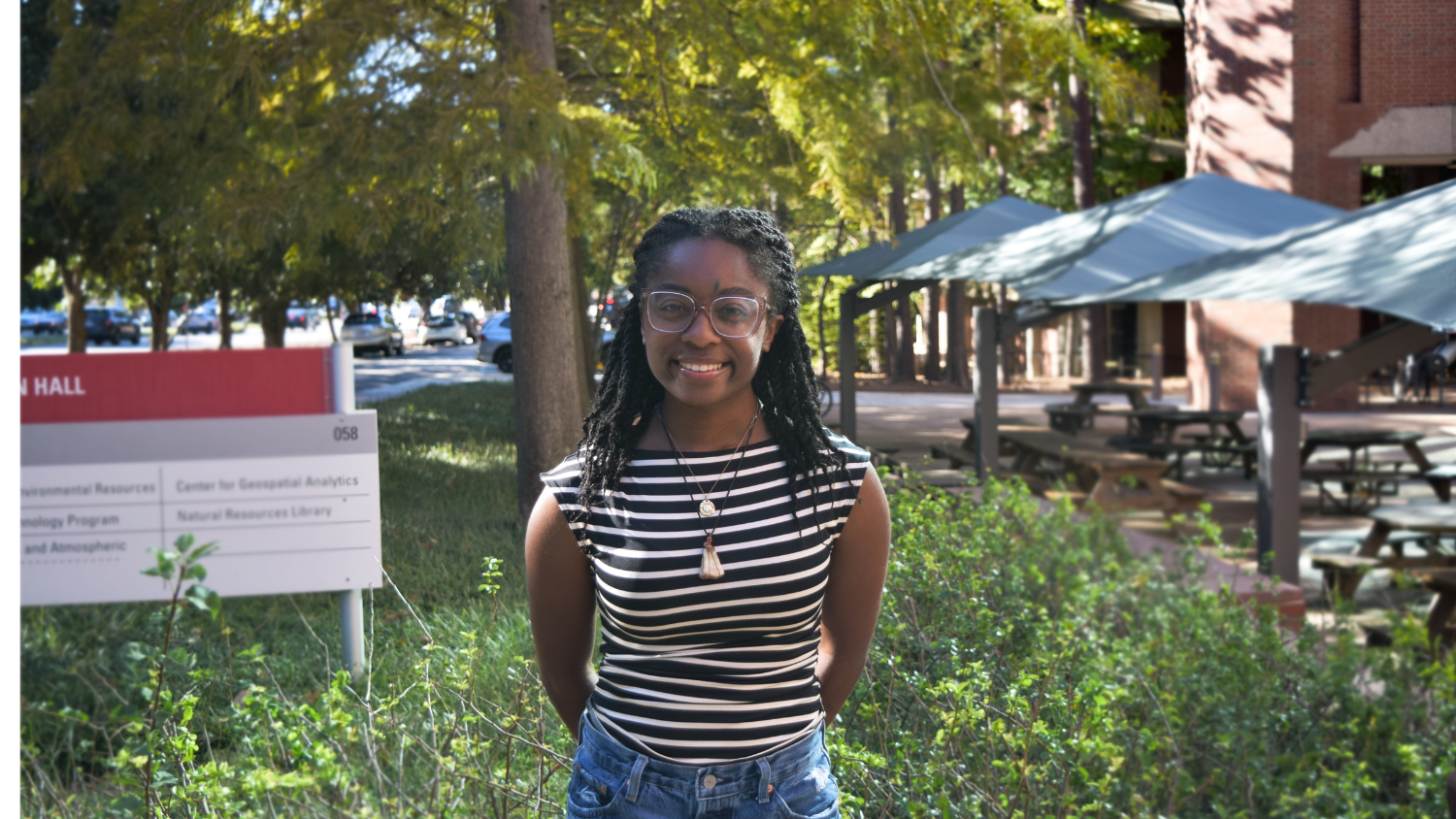 Cadence poses outside Jordan Hall - Cadence Davis '28 Wants a Sustainable Future for Fashion - College of Natural Resources News at NC State