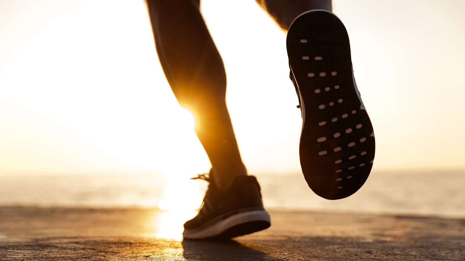 Back view of male sneakers running.