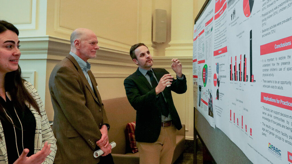 People Looking at a Visual - Graduate Student Resources -Parks Recreation and Tourism Management NC State