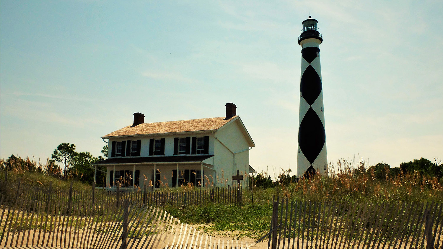 Lighthouse Next to a House - Extension and Outreach - Parks Recreation and Tourism Management NC State