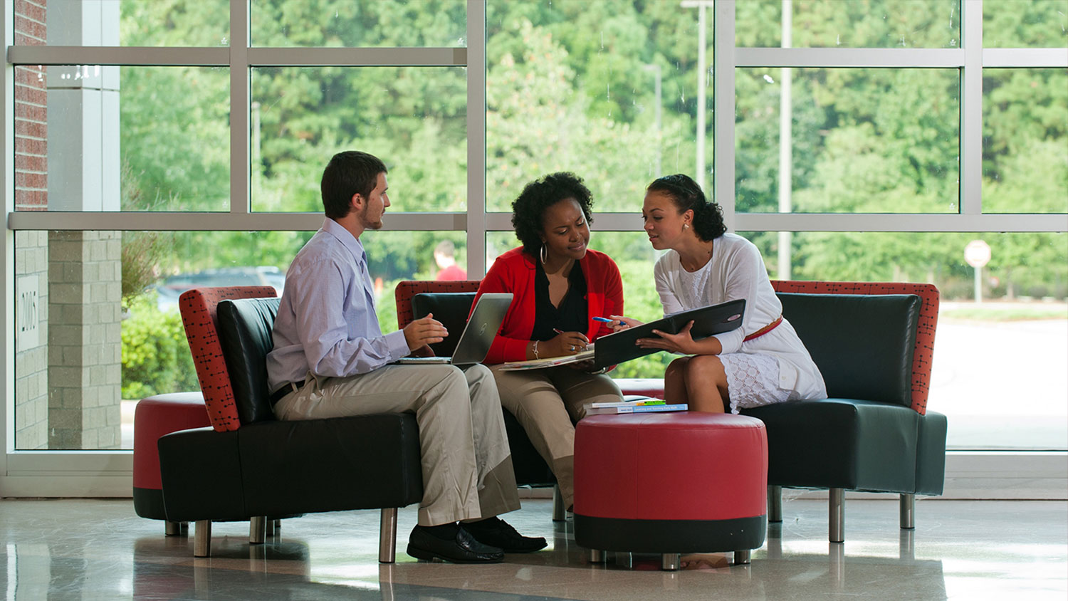 Students sitting together - PRTM Online Masters Degree NC State University