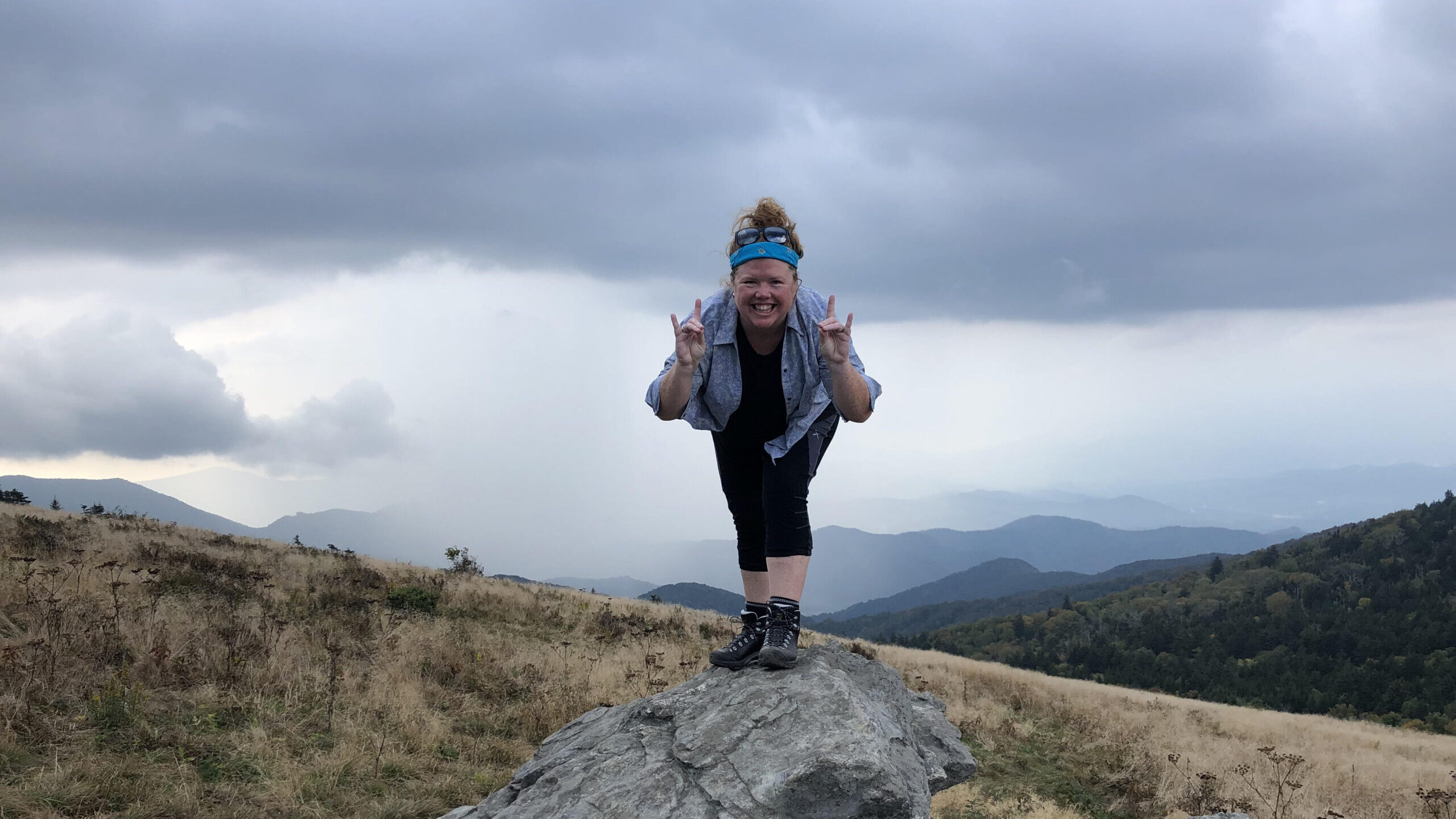 Erin on a Rock - Faculty Feature: Meet Erin Seekamp - Parks, Recreation and Tourism Management at NC State University