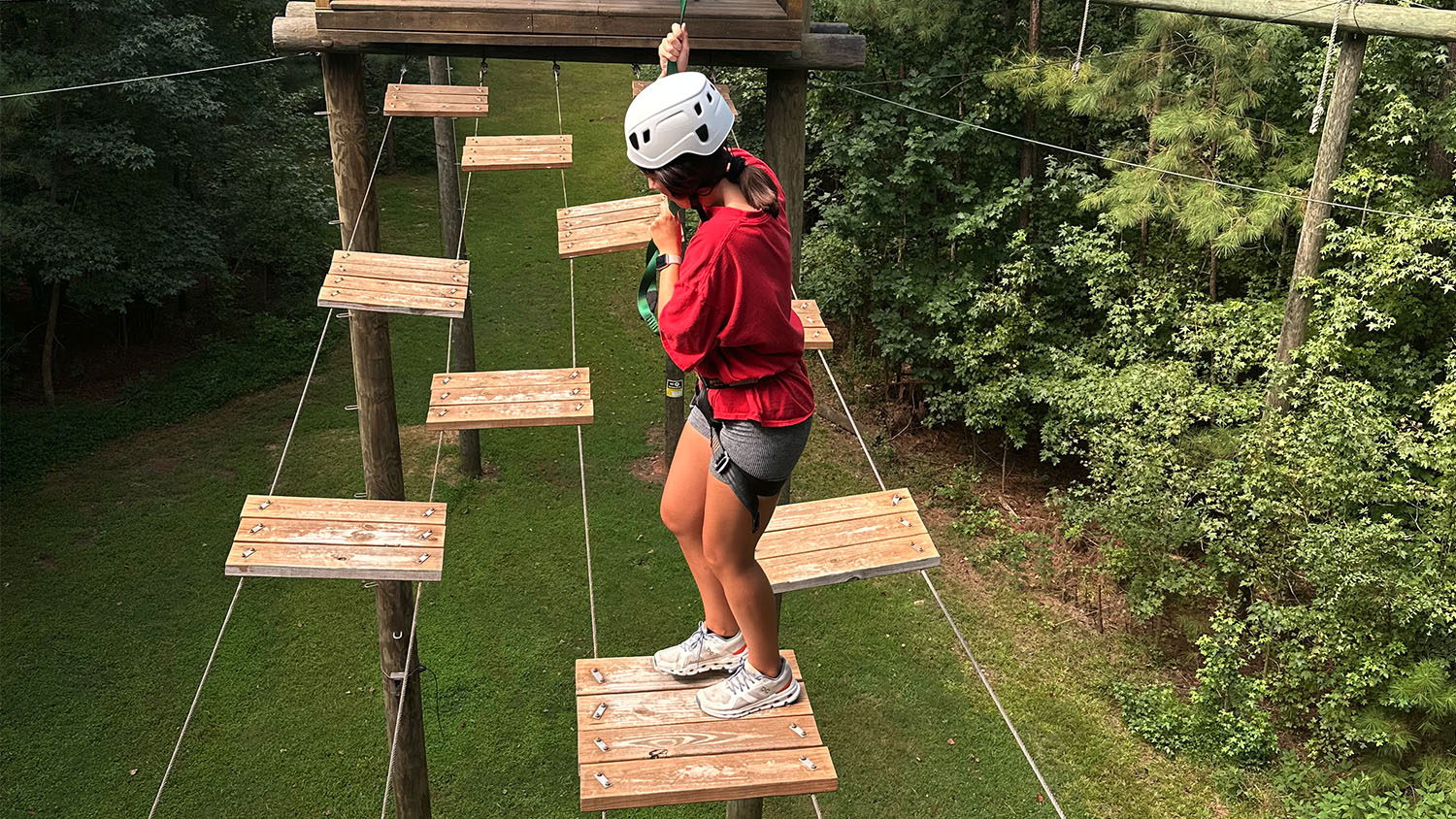 Buzzard Leadership Program student on zipline activity - James Buzzard Leadership Development Program - College of Natural Resources NC State University