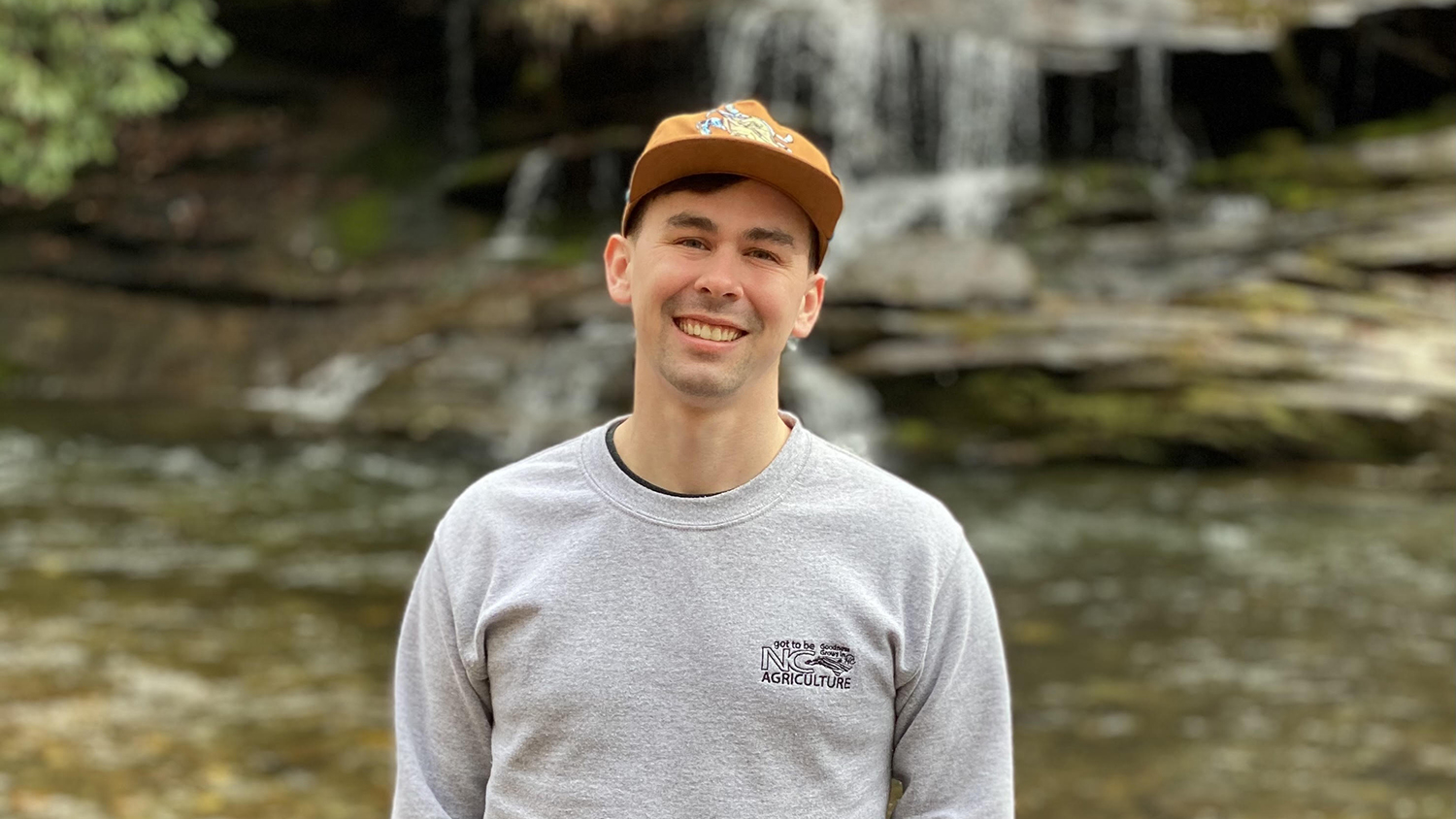 Alex Reinwald near a Waterfall - Alex Reinwald Is NC State's 2021 Esri Innovation Program Student of the Year - College of Natural Resources at NC State University