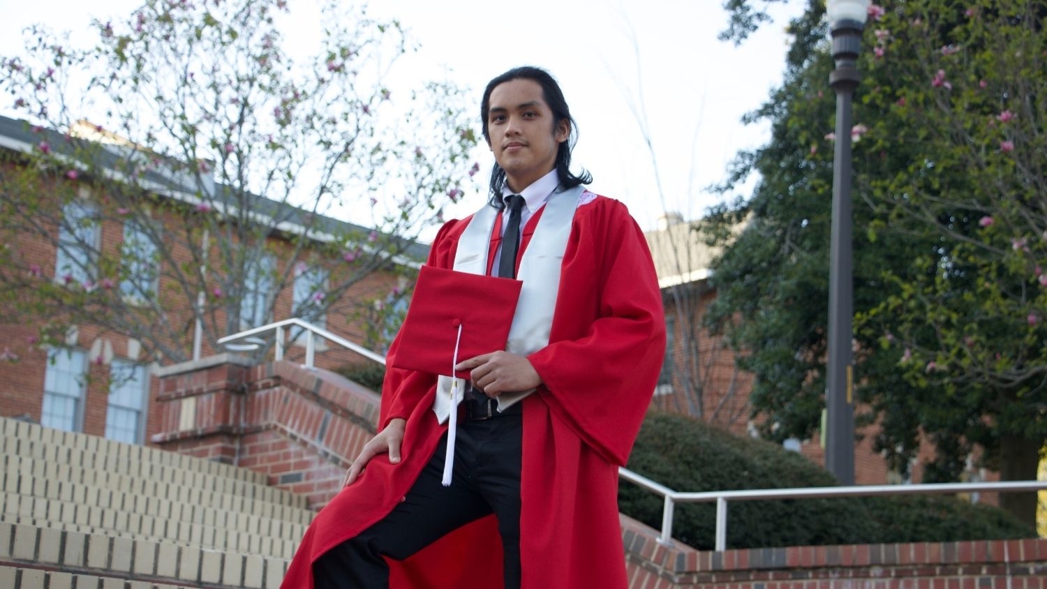 Joshua Pil in Cap and Gown - Graduation to Vocation: Supporting Rare Plant Species in North Carolina - College of Natural Resources at NC State University