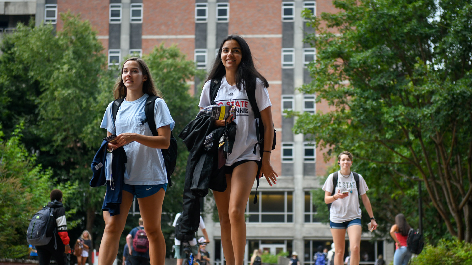 Students walking on campus - The Planet is Our Classroom - College of Natural Resources News NC State University